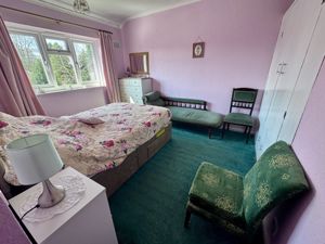 Bedroom One- click for photo gallery